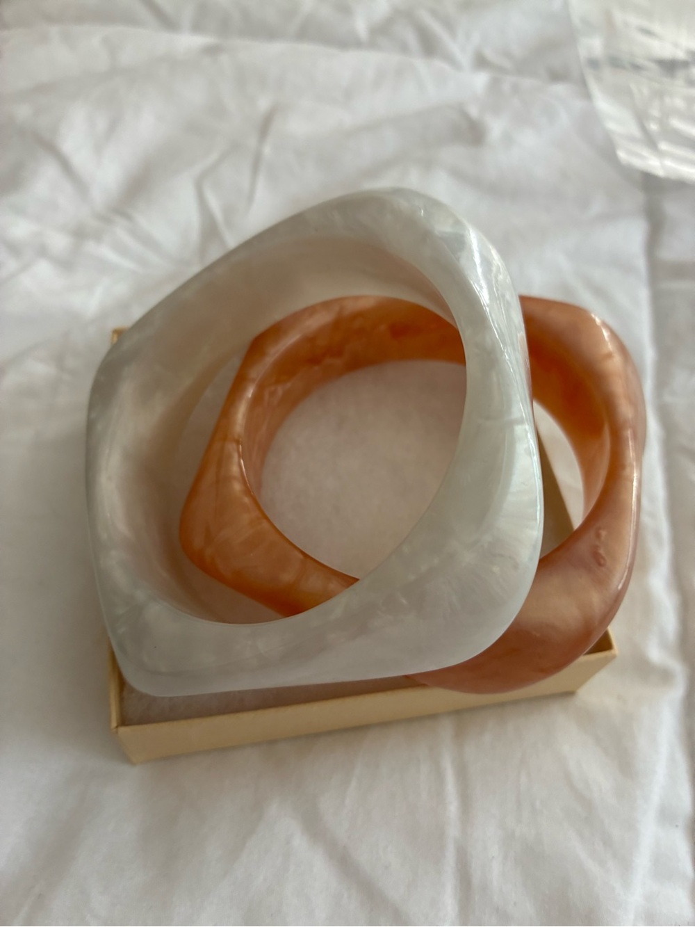 Natasha Couture White and Peach Resin Bangle Bracelets